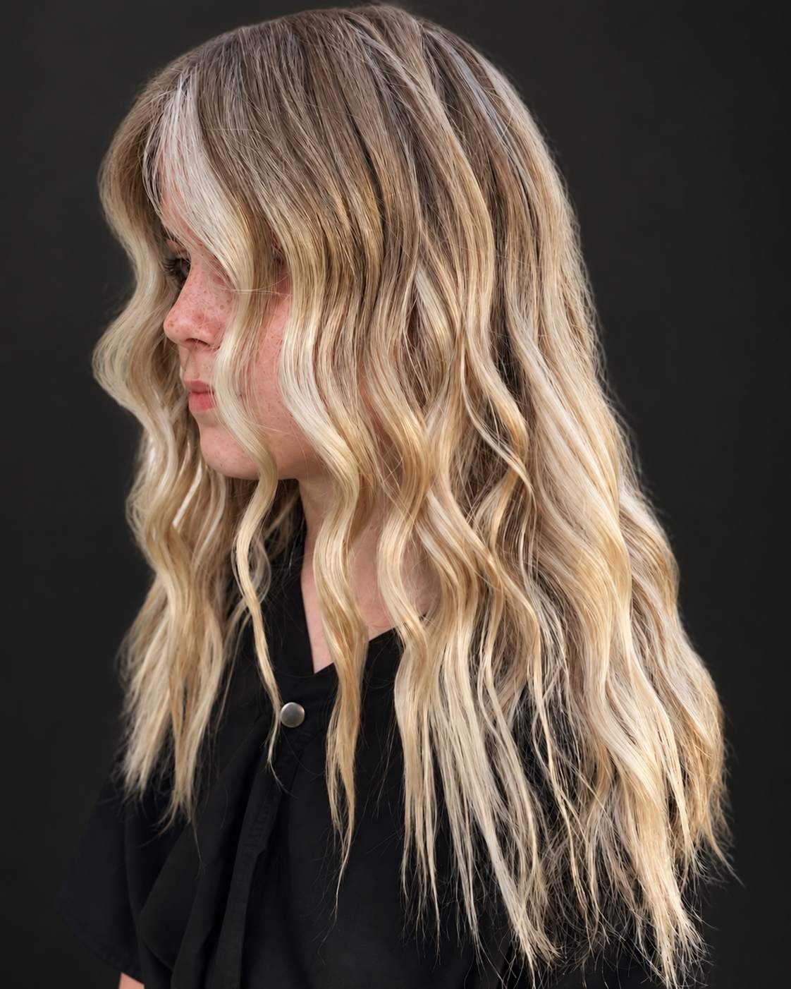 Long dimensional blonde color by Bradley Sanders