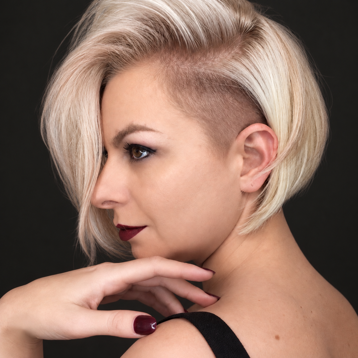 Short platinum blonde color by Bradley Sanders