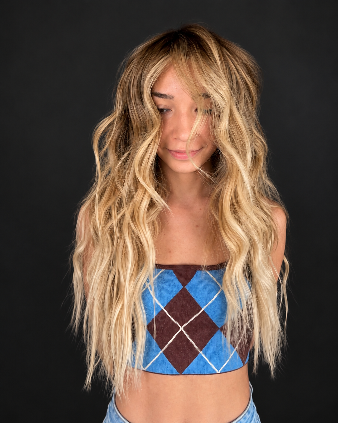 Long lived-in blonde hair color by Bradley Sanders