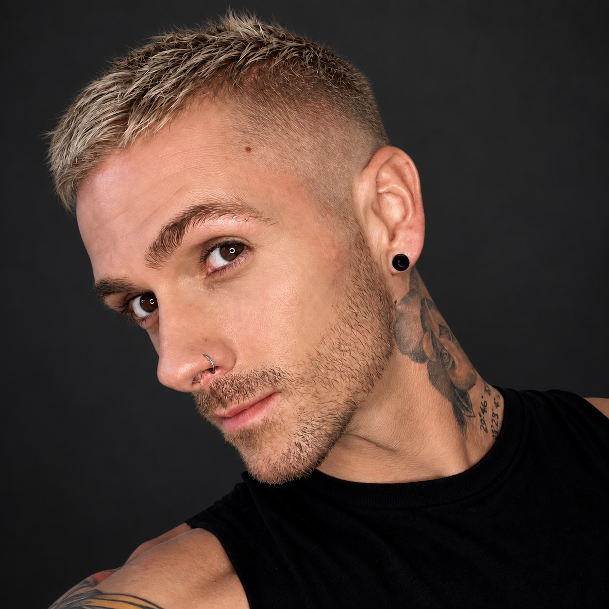 Short creative blonde color by Bradley Sanders